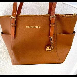 Michael Kors shoulder bag.  14.5 wide 10 tall 4.5 deep.